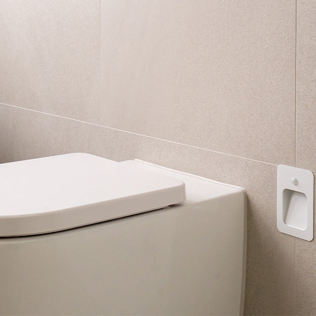 Caroma Liano brushed nickel taps, accessories and Urbane II Cleanflush toilet suite | Timberline shaving cabinet | Modern Bathroom Renovation | The Blue Space