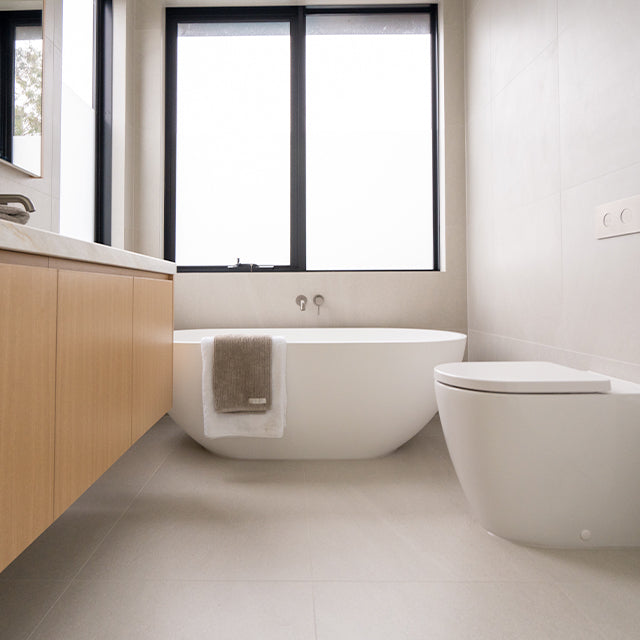 Caroma Liano brushed nickel bath taps | Modern Melbourne Bathroom Renovation | The Blue Space