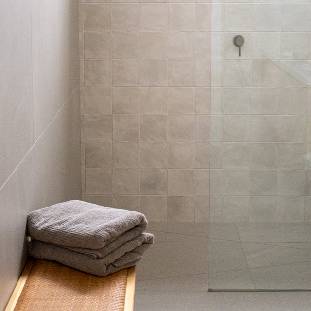 Caroma Liano brushed nickel shower taps | Zellige square white tiles | Modern Melbourne Bathroom Renovation | The Blue Space