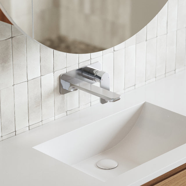 Caroma Luna Lead Free Wall Basin/Bath Mixer Chrome on white textured subway tile