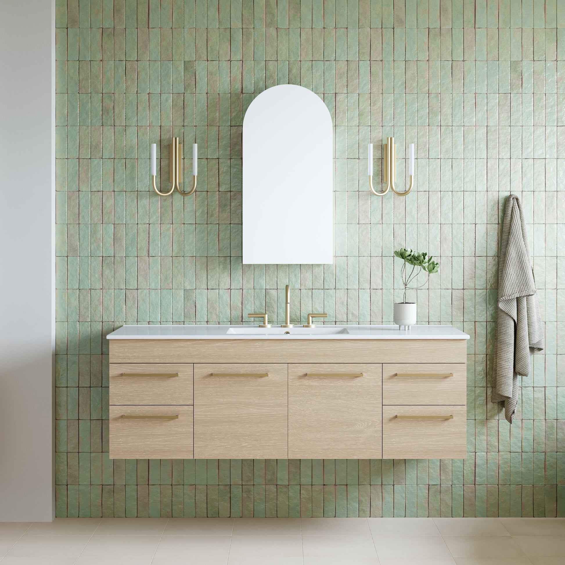 Timberline Indiana wall hung canity and Timberline church arch shaving cabinet with mirror in a beautiful aqua blue handmade tiled bathroom and Phoenix plus lever gold tapware and telbix joshua wall lights in gold.