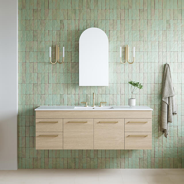 Timberline Indiana wall hung canity and Timberline church arch shaving cabinet with mirror in a beautiful aqua blue handmade tiled bathroom and Phoenix plus lever gold tapware and telbix joshua wall lights in gold.