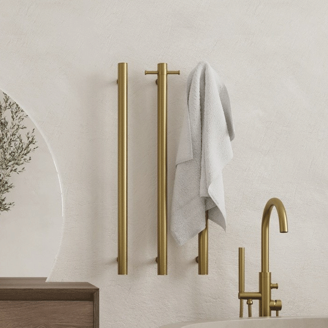 Thermogroup 12V Round Vertical Single Bar Heated Towel Rail Brushed Gold
in beautiful modern warm bathroom design