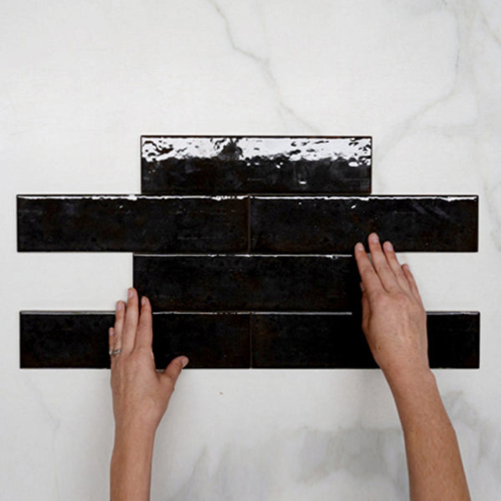 Pattern With Hand Black Andrea Subway Tile Textural Gloss 75 x 300 x 8mm Italian Porcelain - The Blue Space