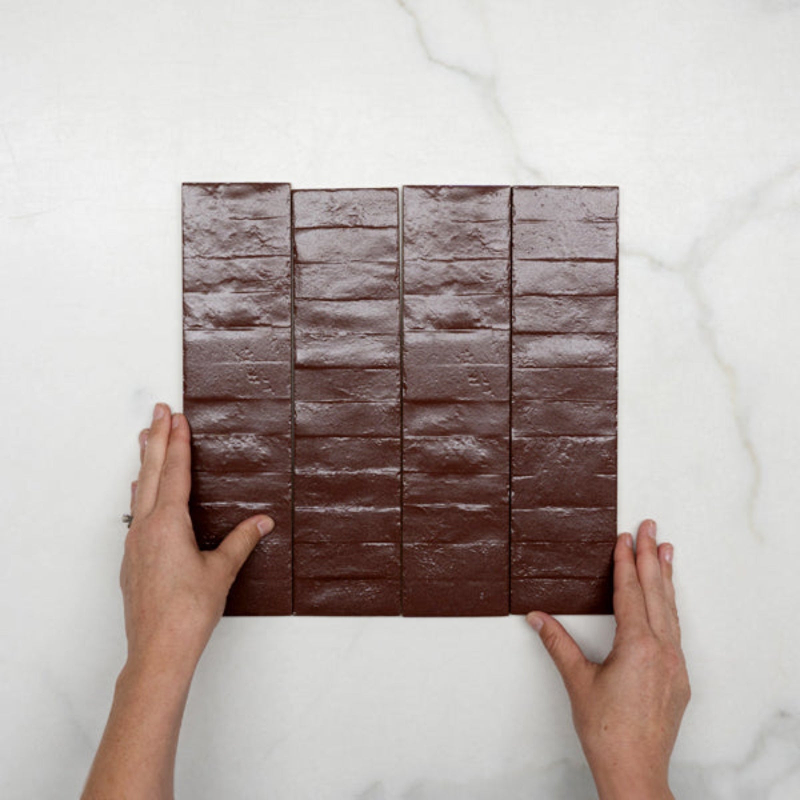 With Hand Burgundy Olivia Feature Subway Matte 75 x 300mm Porcelain - The Blue Space