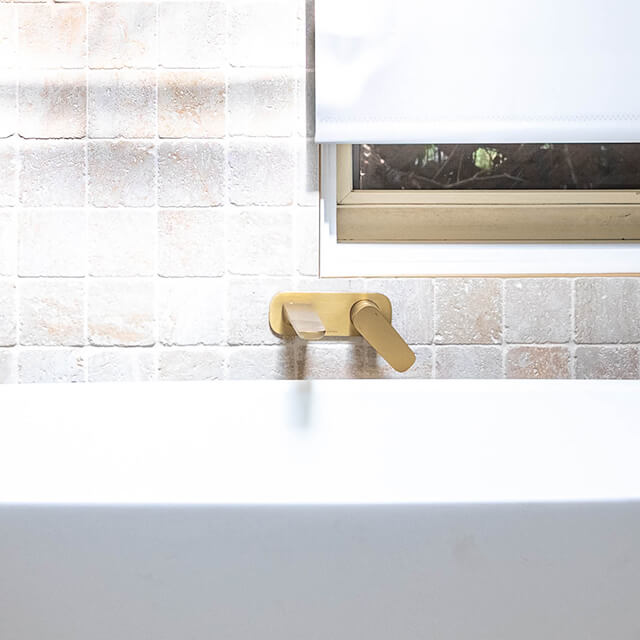 Caroma Contura II 180mm Wall Basin/Bath Mixer - Brushed Brass in Castle Hill