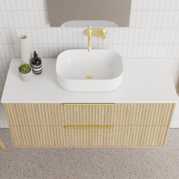 Marquis Lake Wall Hung Vanity 1200mm centre basin in prime oak finish, Symphony Blanco top, glass white basin, brushed brass towel handle and basin mixer features arch mirror in modern bathroom design - The Blue Space