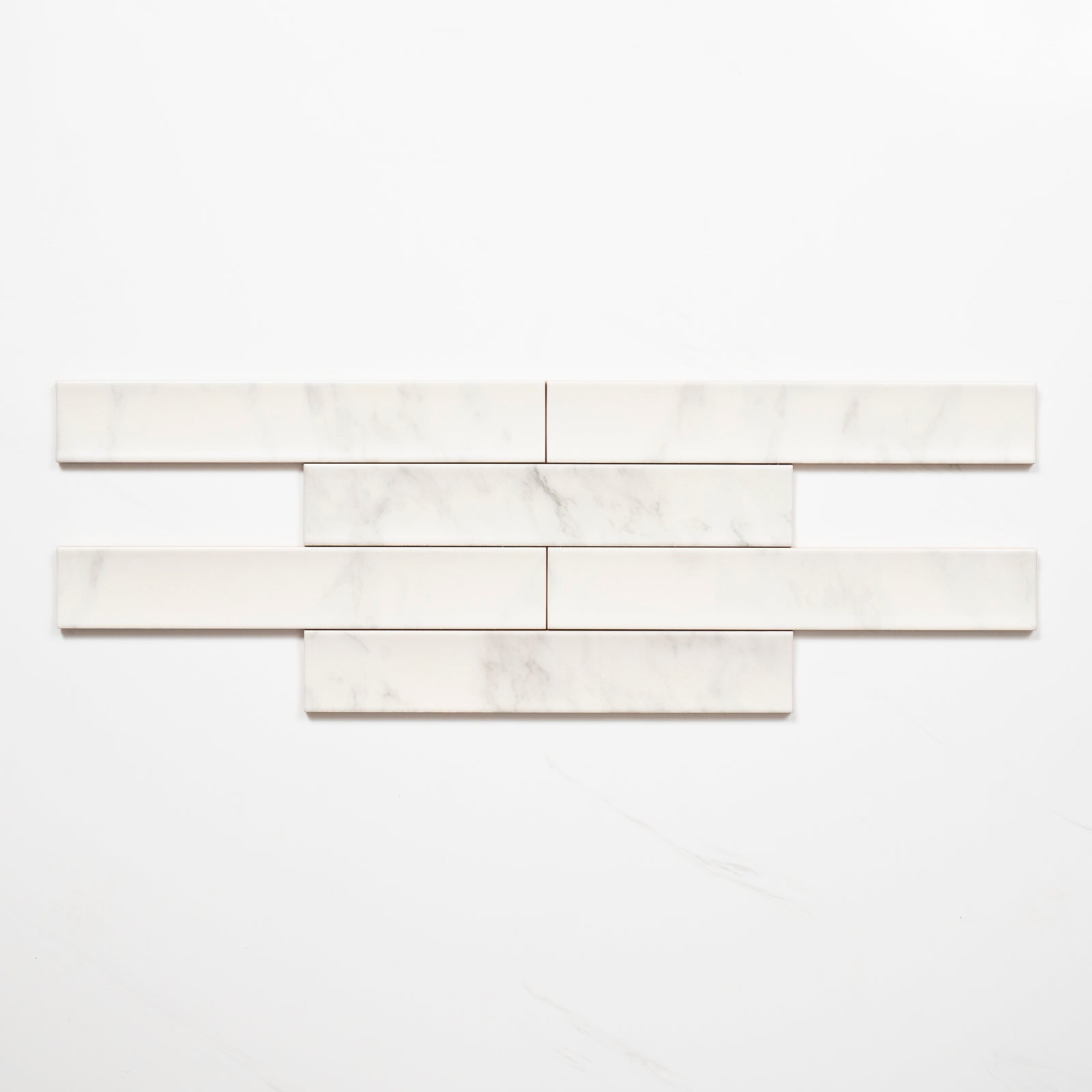 Alternative no Hand Matrix White Marble Look Satin Porcelain Concave Subway Tile 50mm x 300mm AMIWHS13 - The Blue Space