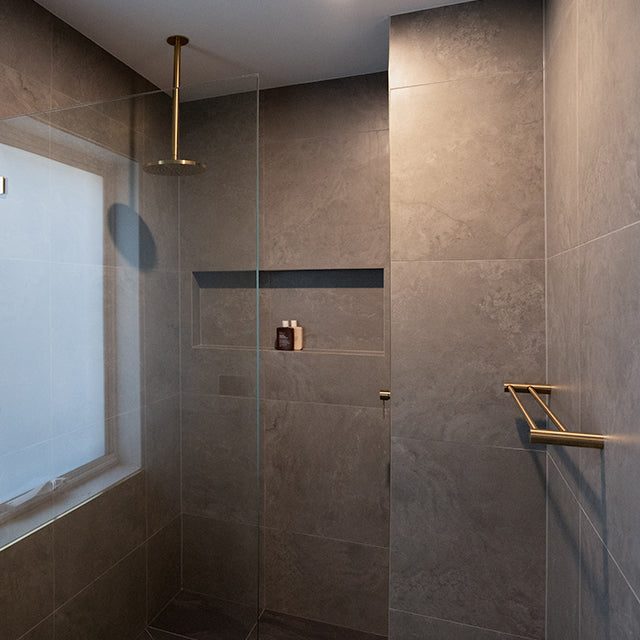 image includes Phoenix Vivid Shower Rose 230mm Round - Brushed Gold, Phoenix Vivid Ceiling Arm Only 450mm Brushed Gold, Phoenix Vivid Slimline Double Towel Rail Brushed Gold, Phoenix Vivid Slimline Shower/Wall Mixer 60mm Backplate Brushed Gold