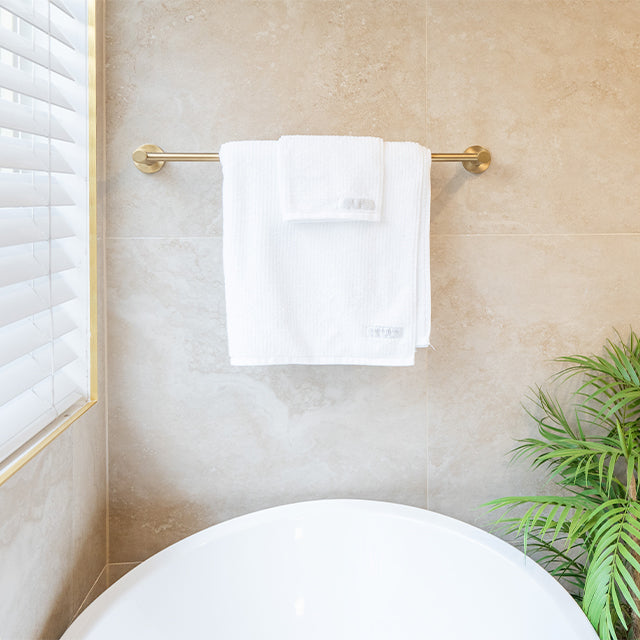 Phoenix Vivid Slimline Single Towel Rail Brushed Gold 600mm - The Blue Space