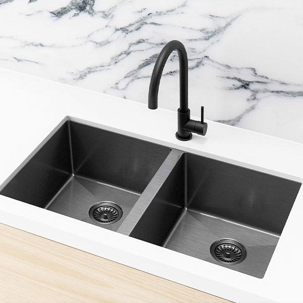 Meir Double Bowl PVD Kitchen Sink 760mm - Brushed Gun Metal Featured on a White Kitchen Benchtop and Marble Splashback with a Squared Off Sink Mixer -The Blue Space