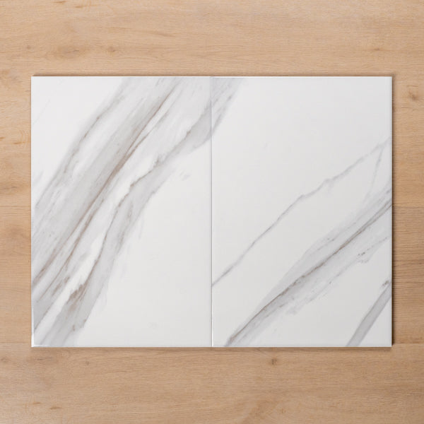 Perisher White Marble Gloss Cushioned Edge Ceramic Tile 300x450mm Double - The Blue Space