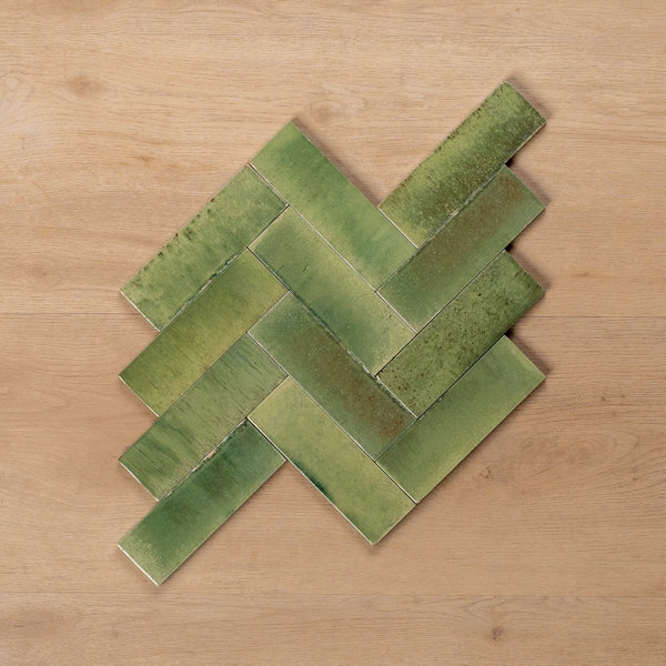 Sicily Giada Green Gloss Cushioned Edge Porcelain Tile 50x150mm Herringbone Pattern - The Blue Space