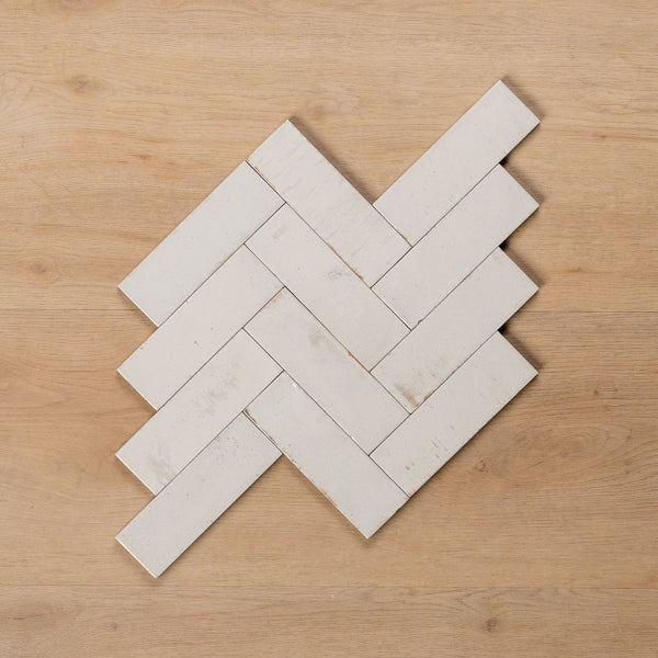 Sicily Bianco White Gloss Cushioned Edge Porcelain Tile 50x150mm Herringbone Pattern - The Blue Space