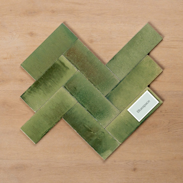 Sicily Giada Green Gloss Cushioned Edge Porcelain Tile 75x200mm Herringbone Pattern - The Blue Space