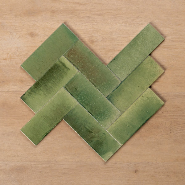 Sicily Giada Green Gloss Cushioned Edge Porcelain Tile 75x200mm Herringbone Pattern - The Blue Space