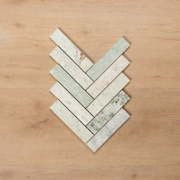 Sample of Cottesloe Ming Green Herringbone Honed Marble Mosaic Tile - The Blue Space