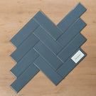 Coolum Blue Gloss Cushioned Edge Ceramic Tile 82x257mm Herringbone Pattern - The Blue Space