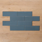 Coolum Blue Gloss Cushioned Edge Ceramic Tile 82x257mm Brick Pattern - The Blue Space