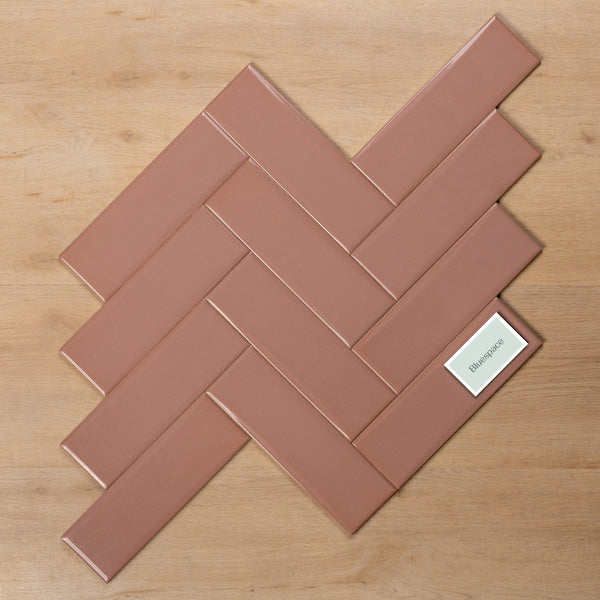 Coolum Pink Gloss Cushioned Edge Ceramic Tile 82x257mm Herringbone Pattern - The Blue Space