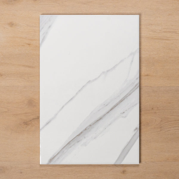 Perisher White Marble Gloss Cushioned Edge Ceramic Tile 300x450mm - The Blue Space