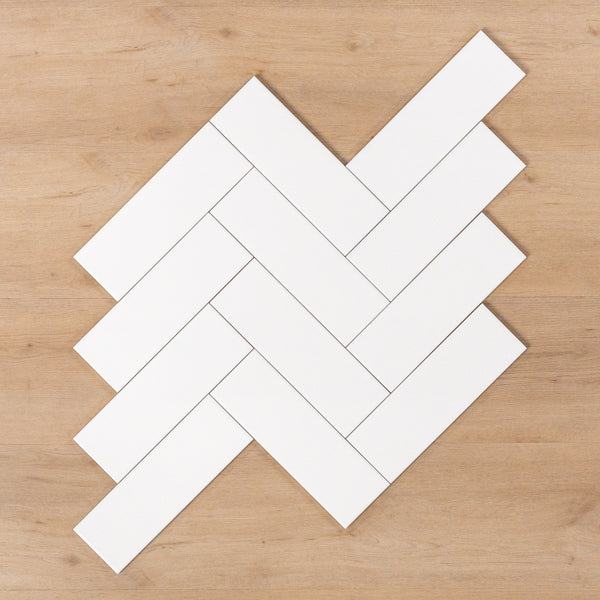 Wategos Gloss White 100x300mm Herringbone Pattern - The Blue Space