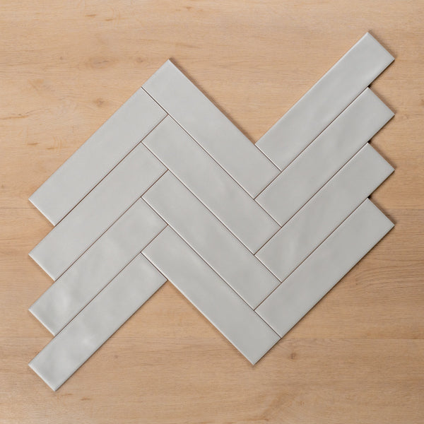 Whitehaven Blue Wavy Satin Ceramic Subway Tile 68x280mm Herringbone Pattern - The Blue Space
