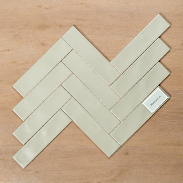 Whitehaven Green Wavy Satin Ceramic Subway Tile 68x280mm Herringbone Pattern - The Blue Space