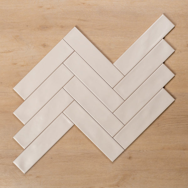 Whitehaven Porcelain Wavy Satin Ceramic Subway Tile 68x280mm Herringbone Pattern - The Blue Space