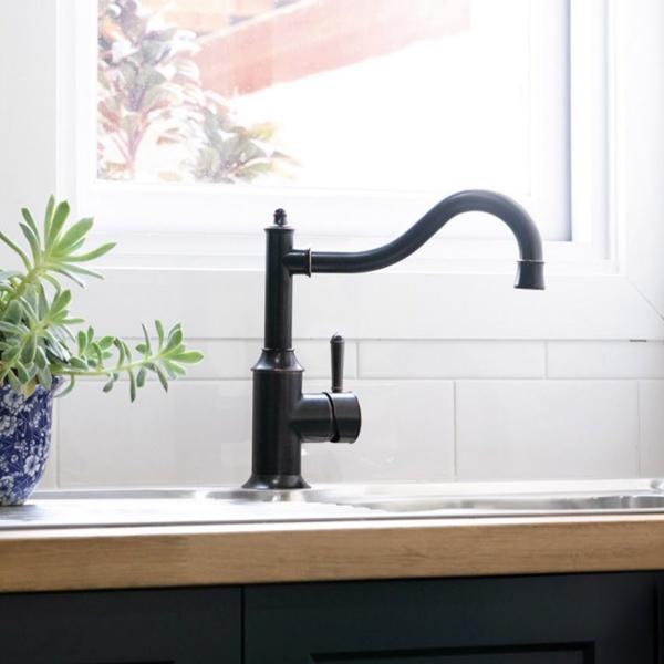 Phoenix Nostalgia Sink Mixer 220mm Shepherds Crook - Antique Black in kitchen