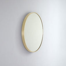 Remer Modern Round 610mm - 810mm aluminium framed mirror in Brushed Brass - The Blue Space