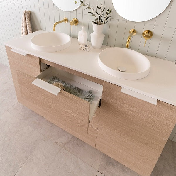 ADP Glacier Hamper Floor Mount 1500 Double Bowl in Coastal Oak Woodmatt cabinet finish with Matte White Francis handles, 20mm Frost Cherry Pie benchtop with Matte WHite Respect Semi-Inset basins. Features Fresh White interior with Hettich MultiTech drawers with sold-close adapter in white | The Blue Space