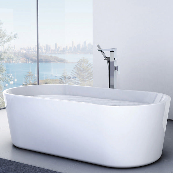 Caroma Aura Freestanding Bath by Caroma in luxury bathroom - The Blue Space