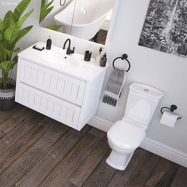 Fienza Eleanor Gooseneck Basin Mixer - Matte Black featured in a bathroom with matte black accessories