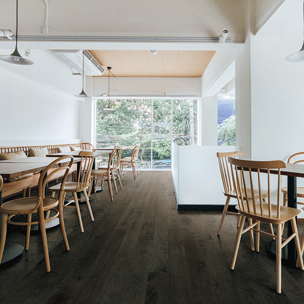Genuine Oak Engineered Flooring Slate Grey in cafe setting - The Blue Space