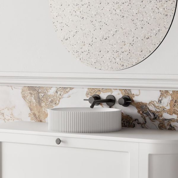 Cassa Design V Groove Solid Surface Stone Above Counter Basin 360mm Matte White features matte black wall mounted 3 piece set in marble bathroom design side view - The Blue Space