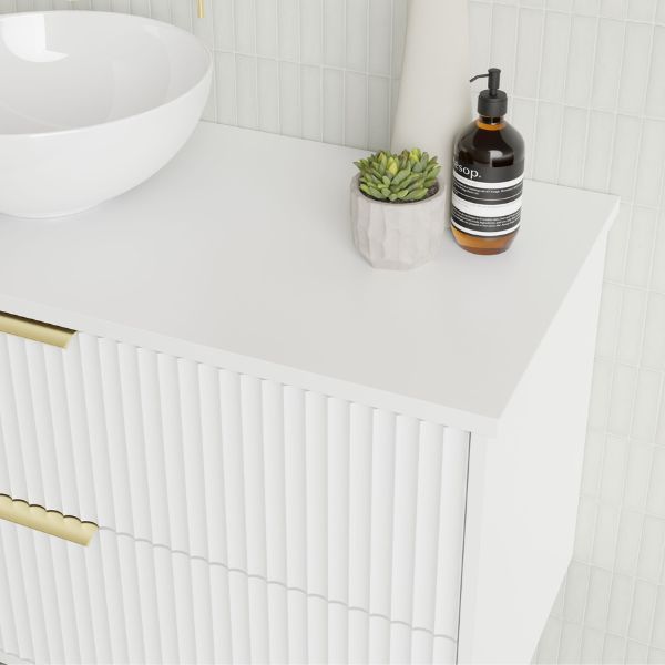 Marquis Lake Wall Hung Vanity 1200mm in Symphony Blanco top, White finish, gloss white basin, brushed brass basin mixer and top-pulled handle in side view detail - The Blue Space