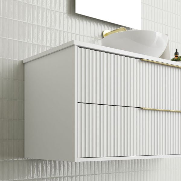 Marquis Lake Wall Hung Vanity 1200mm in Symphony Blanco top, White finish, gloss white basin, brushed brass basin mixer and top-pulled handle in side view detail - The Blue Space