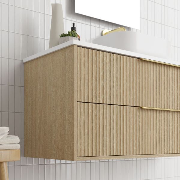 Marquis Lake Wall Hung Vanity 1200mm centre basin in prime oak finish, Symphony Blanco top, glass white basin, brushed brass towel handle and basin mixer features arch mirror in modern bathroom design - The Blue Space