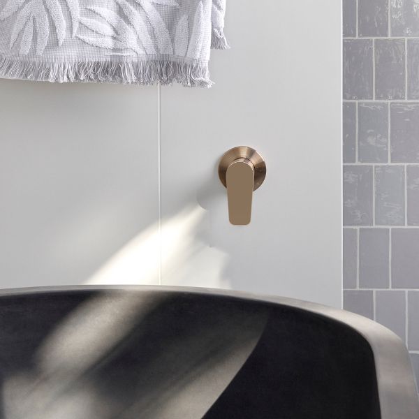 Meir Paddle Round Wall Mixer Champagne in modern bathroom design - The Blue Space