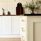 Zanda Mayfair Satin Brass Cabinet Handle in white classic kitchen | The Blue Space