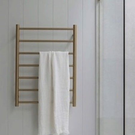 Heat Up Your Bathroom with these heated towel rails and under floor heating products | The Blue Space