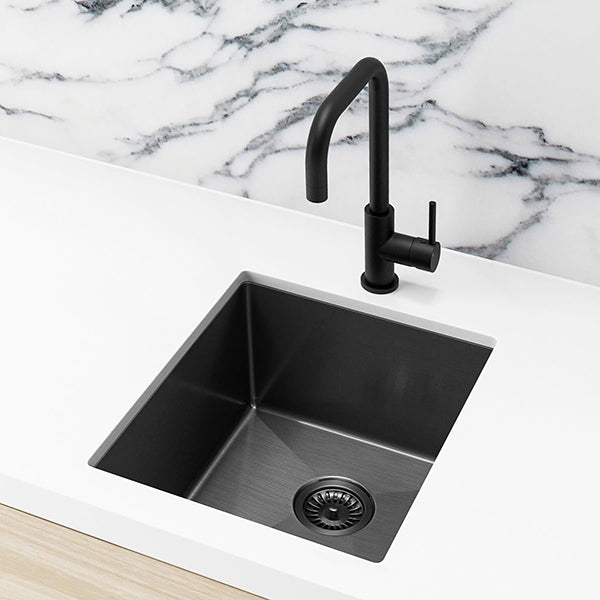 Meir Single Bowl PVD Kitchen Sink 440mm - Brushed Gun Metal Featured on a White Kitchen Benchtop and Marble Benchtop and Squared Off Sink Mixer - The Blue Space