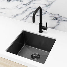 Meir Single Bowl PVD Kitchen Sink 450mm - Gunmetal Black Featured on a White Kitchen Benchtop with Marble Splashback and Squared Off Sink Mixer in Gun Metal - The Blue Space