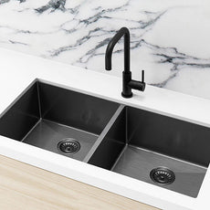Meir Single Bowl PVD Kitchen Sink 860mm - Gunmetal Black Featured on a White Kitchen Benchtop and Marble Splashback with a Squared off Sink Mixer -The Blue Space