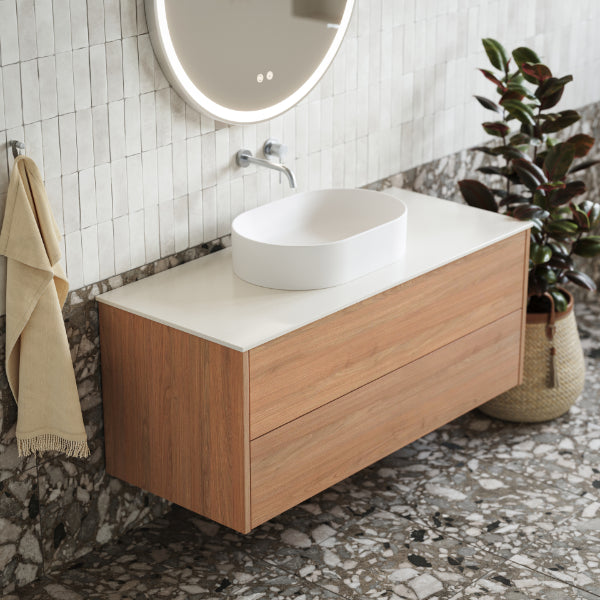 Ingrain Barrington 1200mm Sustainable Timber Vanity in Tasmanian Oak with white stone top and Ingrain Round LED mirror and brushed nickel tapware in modern, textural bathroom - The Blue Space