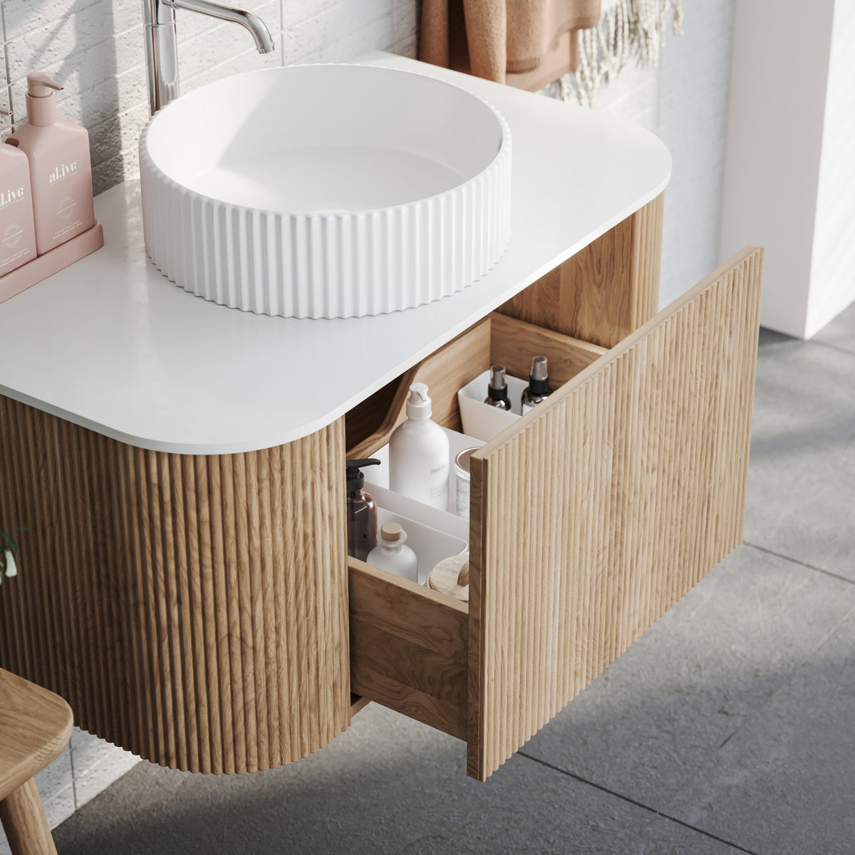 Ingrain Curved Fluted Wall Hung Vanity 900mm with drawer open at The Blue Space
