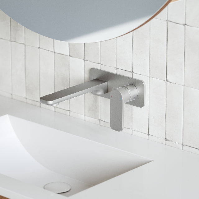 Caroma Luna Lead Free Wall Basin/Bath Mixer Brushed Nickel on white textured feature tile