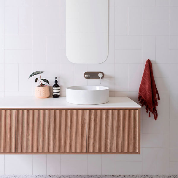 ADP Clifton Vanity in Prime Oak Woodmatt cabinet finish, 12mm Bright White Cherry Pie benchtop, and ADP Margot basin in matte white - The Blue Space