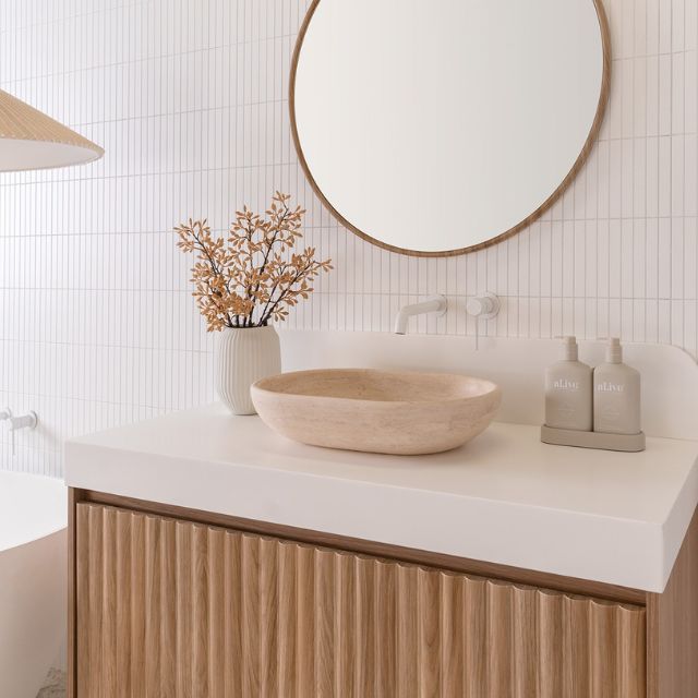 ADP Harper Wall Hung Vanity 1135mm Centre Bowl With Prime Oak Cabinet Finish Arctic White Durasein benchtop and splash, Ella Framed Mirror and Ollie Travertine Basin & Soul Tapware in Matte White HARFAS1135WHCDU | The Blue Space